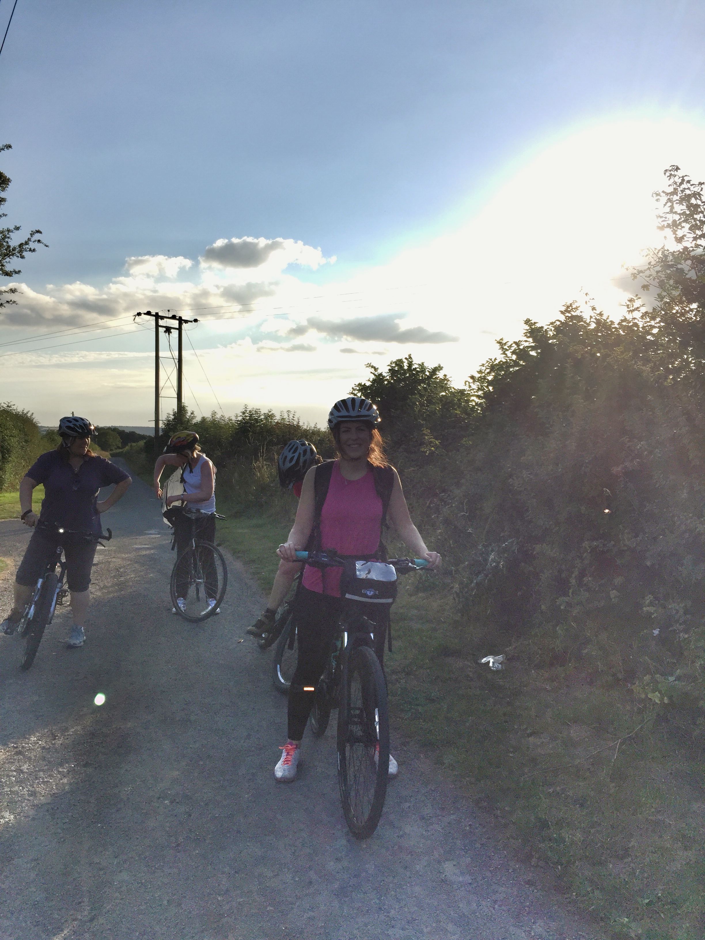 Four cyclists in the late evening sunsine