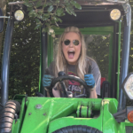 Hannah pictured in a mini digger (that she wasn't allowed to drive)